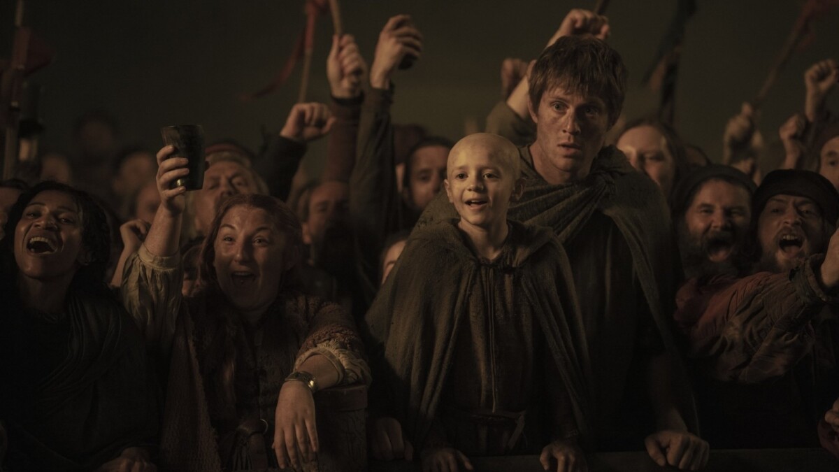 Dexter Sol Ansell and Peter Claffey as Egg and Dunk in a crowd in "A Knight of the Seven Kingdoms."